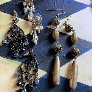 Three pairs of dangly earrings